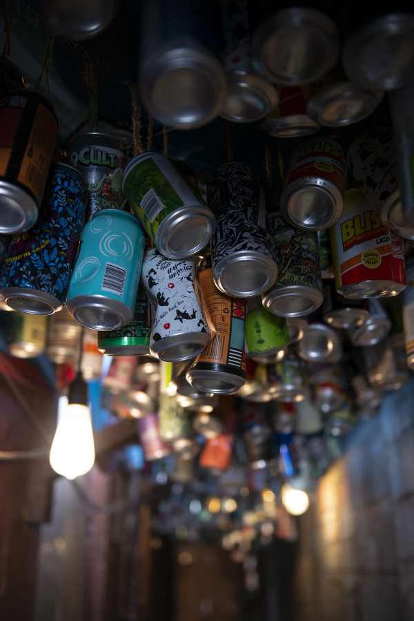 The iconic beer can alleyway entrance to Satya Chai Lounge, Sandringham, Auckland.