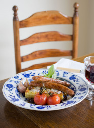 Merguez Sausage with Herbed Polenta and Roasted Tomatoes